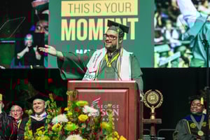 a23c1def1d9a-Zayd_Gesturing_to_Crowd