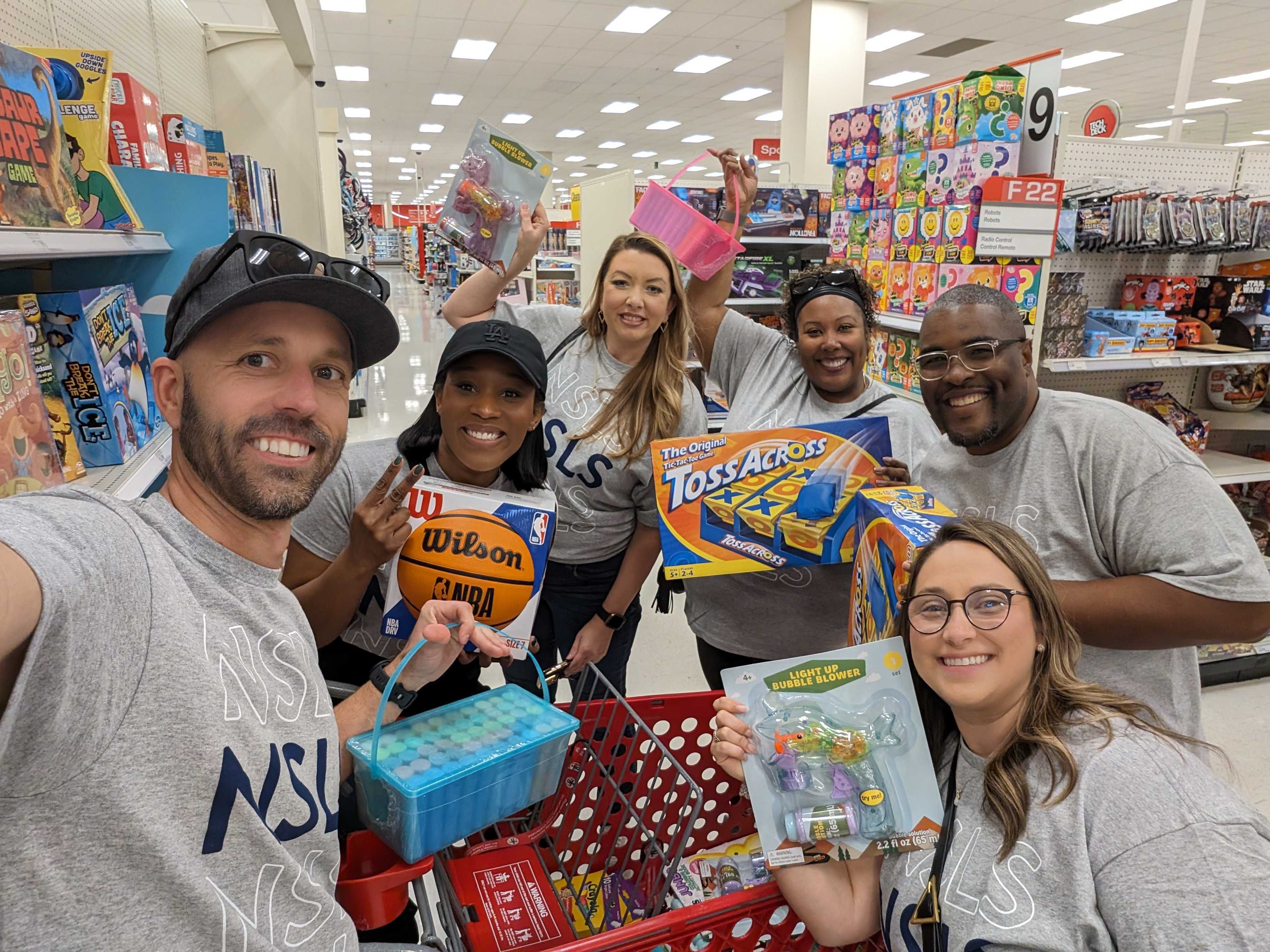 NSLS employees participate in a donation scavenger hunt benefiting local charities