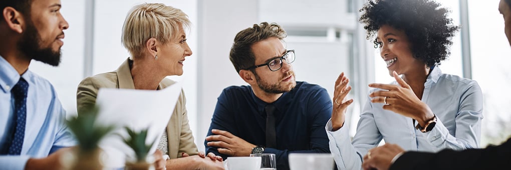 Working professionals having a discussion.