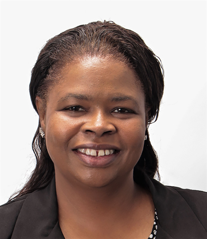 Sharmin Blue Headshot.